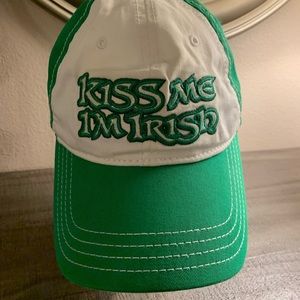 Green and white baseball hat.